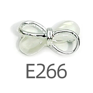 Transfronterizo Japonés arco de uñas accesorios de pajarita caliente simple todo fósforo tridimensional hueco joyería de uñas de diamantes al por mayor