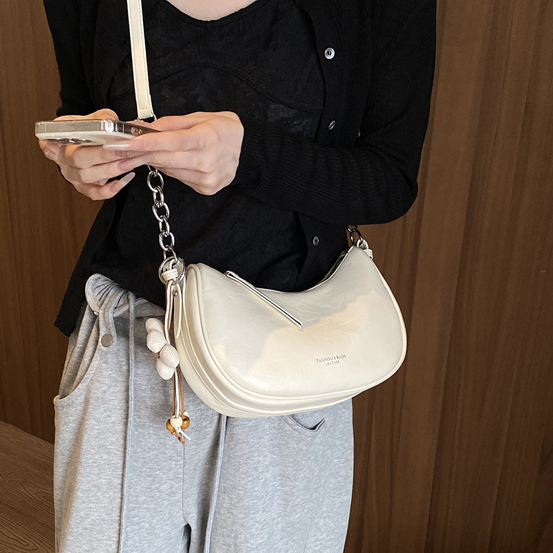 Bolso de mano popular de este año bolso de mujer 2026 nueva moda simple bolso de hombro de brazo universal bolso de饺os para mujeres