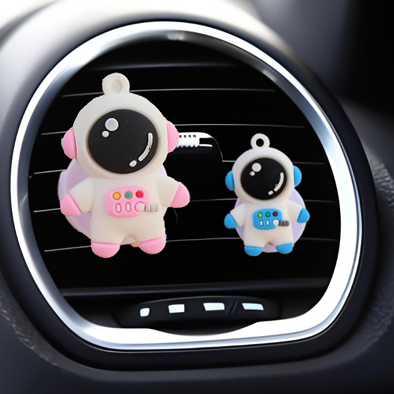 Clip de salida de aire de automóvil astronauta muñeca perfumes de automóviles dibujos animados adornos de decoración de automóviles plástico interior