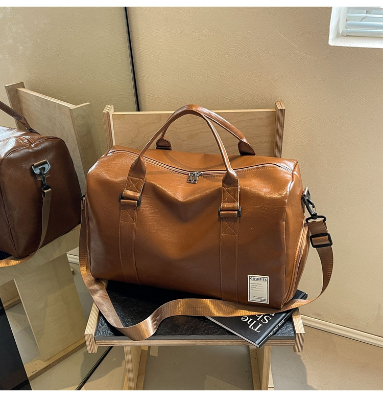 Men's high-end travel bag, large-capacity sports and fitness bag, women's leather travel clothes, luggage bag for men undefined