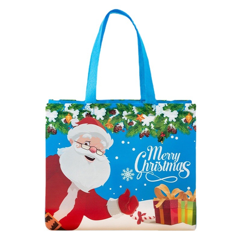 Amazon bolsa de asas de Navidad de dibujos animados personalizados Santa muñeco de nieve recubierto no tejido bolsa de regalo en stock