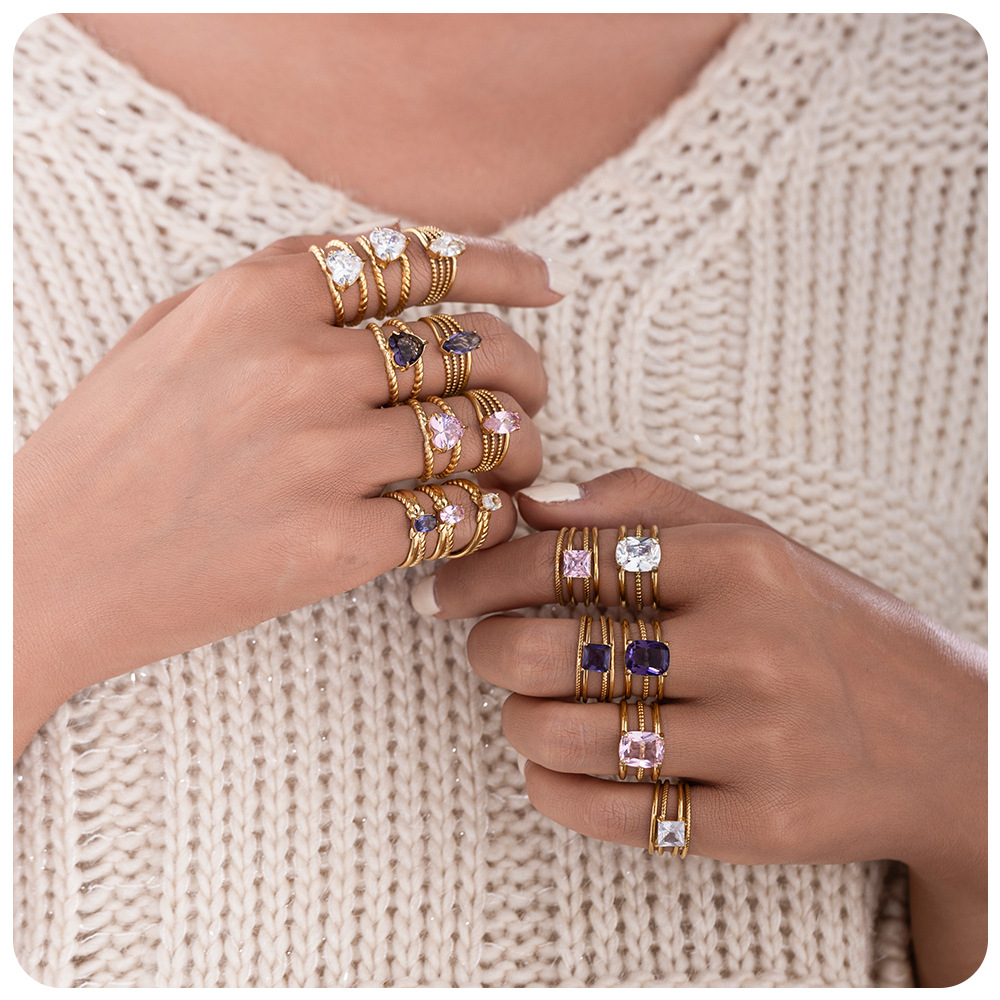 TENA oro de 18 quilates de color zirconos viento de alta calidad anillo de lujo ligero de moda joyas de acero inoxidable