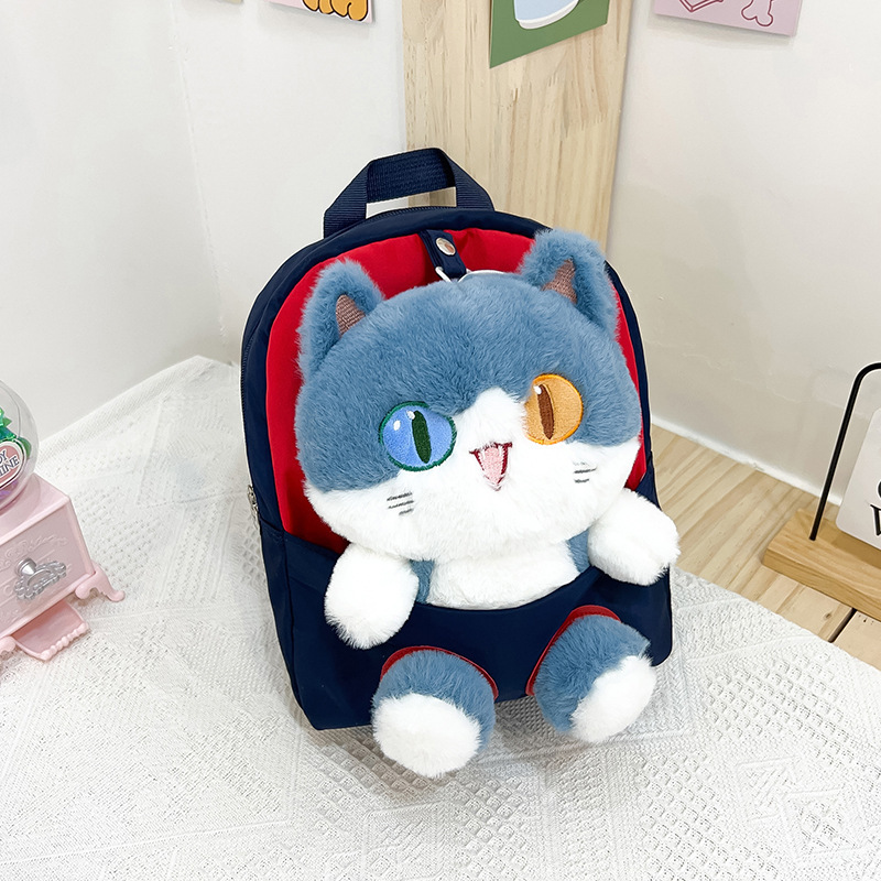 Nueva mochila de dibujos animados para niños tendencia pupila diferente gato muñeca mochila desmontable jardín de infantes en stock