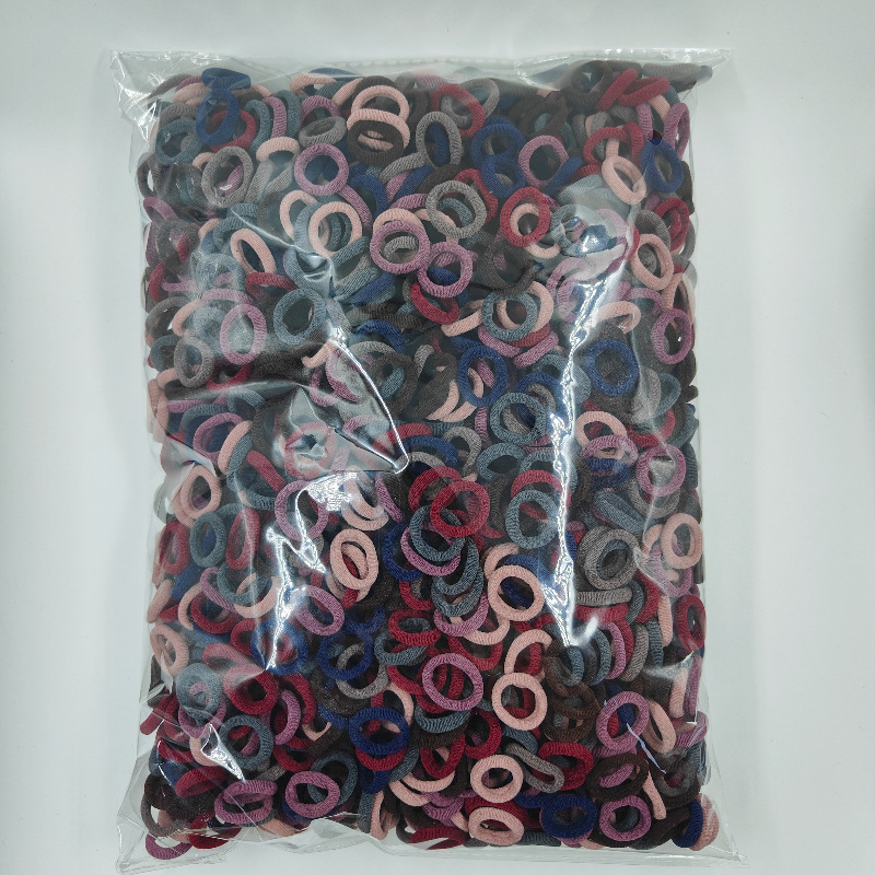 Fábrica directa sin costuras de alta elasticidad cuerda de cabeza para niños anillo de toallas OPP2000 anillo de cabello de cabello para bebés al por mayor