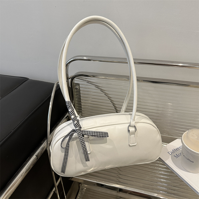 Bolsa de mano de arco de ballet para mujeres 2024 nueva moda coreana nicho bolsas de brazo de gran capacidad bolsas de almohada