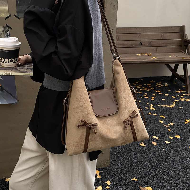 Nueva versión coreana de la mochila para niños y niñas, mochila para bebés de gran capacidad, mochila para bebés, mochila para niños con arco lindo.