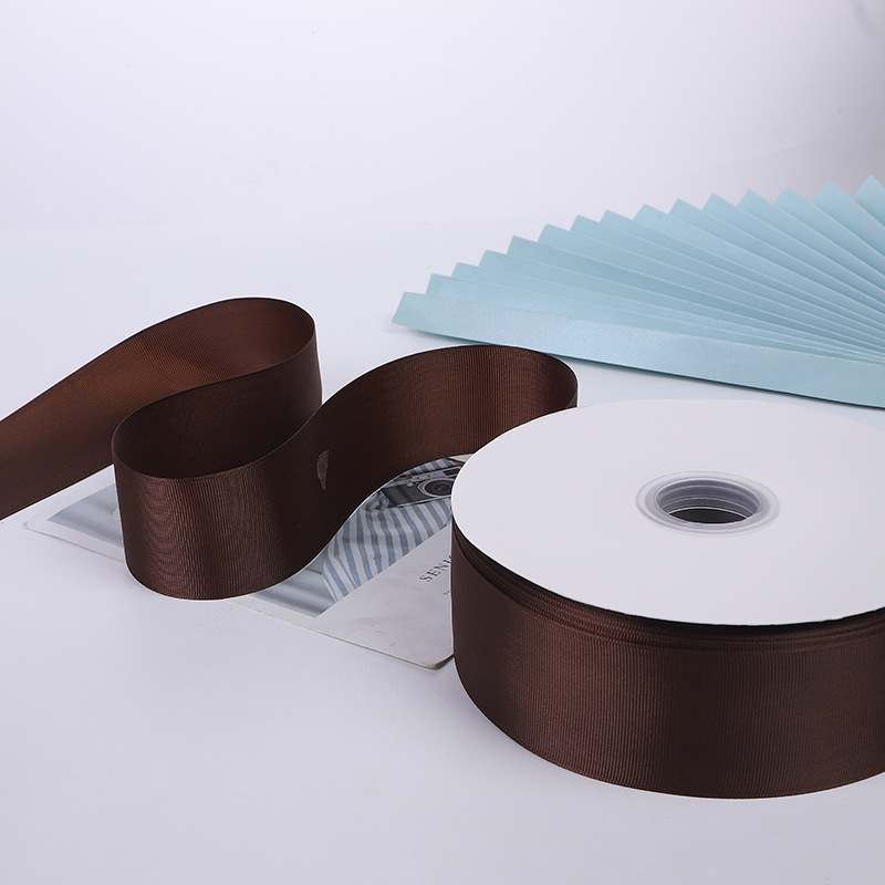 Suministro directo de fábrica cinta roscada cinta marrón caja de regalo embalaje bolso cinta accesorios de ropa cinta al por mayor