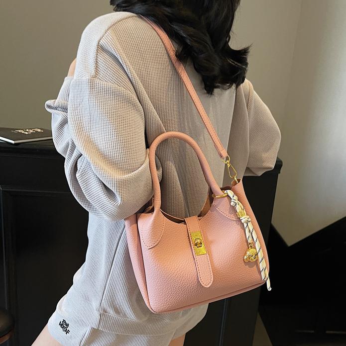 Bolso de cesta de verduras simple de comercio exterior para mujer 2025 nuevo bolso de hombro casual salvaje de moda bolso de cubo de aire extranjero