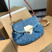 2025新款高级水洗牛仔饺子包小猪包腋下包女包元宝潮单肩斜挎小包