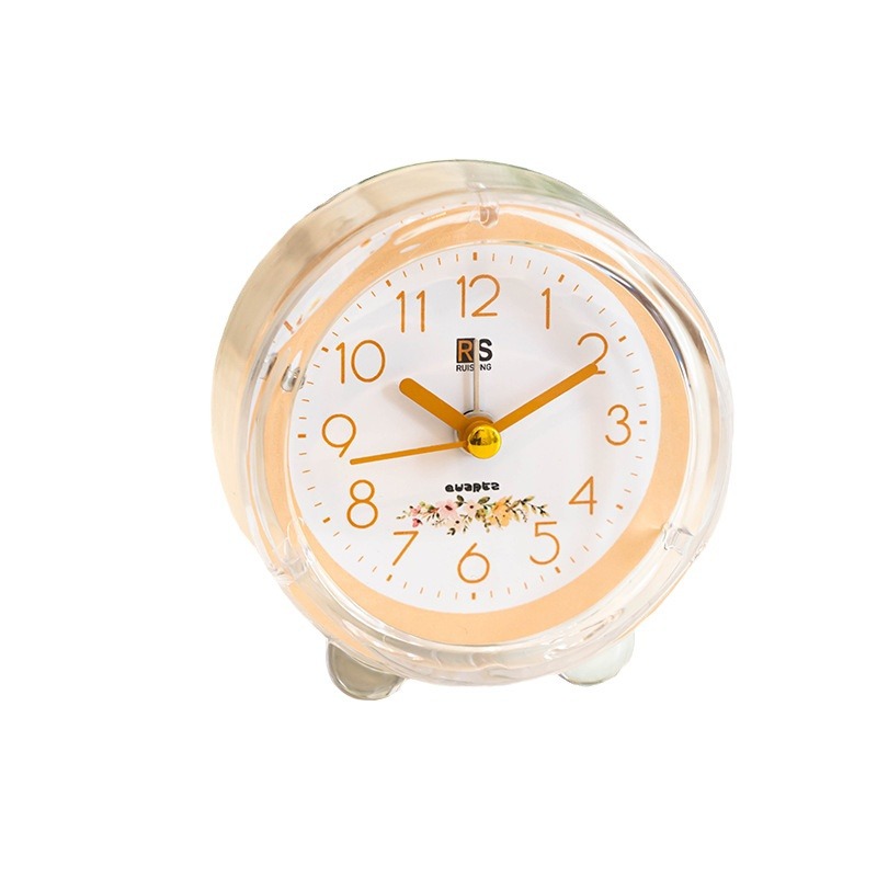 Ventas de fábrica reloj despertador de plástico redondo estudiante reloj de color caramelo con luz de dibujos animados claro reloj despertador fácil de llevar