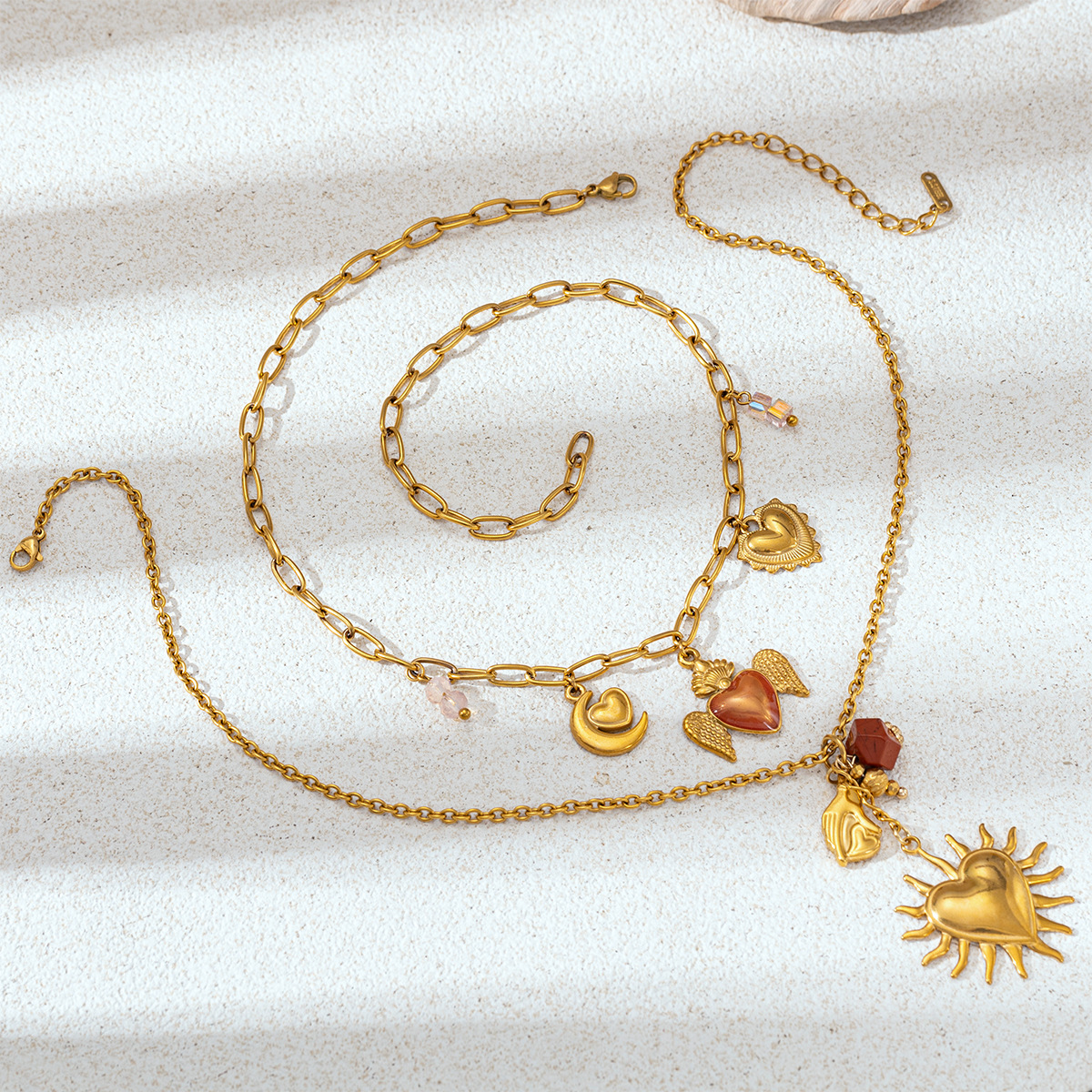 Collar de acero inoxidable TENA Europa y los Estados Unidos nicho ligero de lujo sol amor multi-colgante conjunto de joyería universal venta caliente transfronteriza