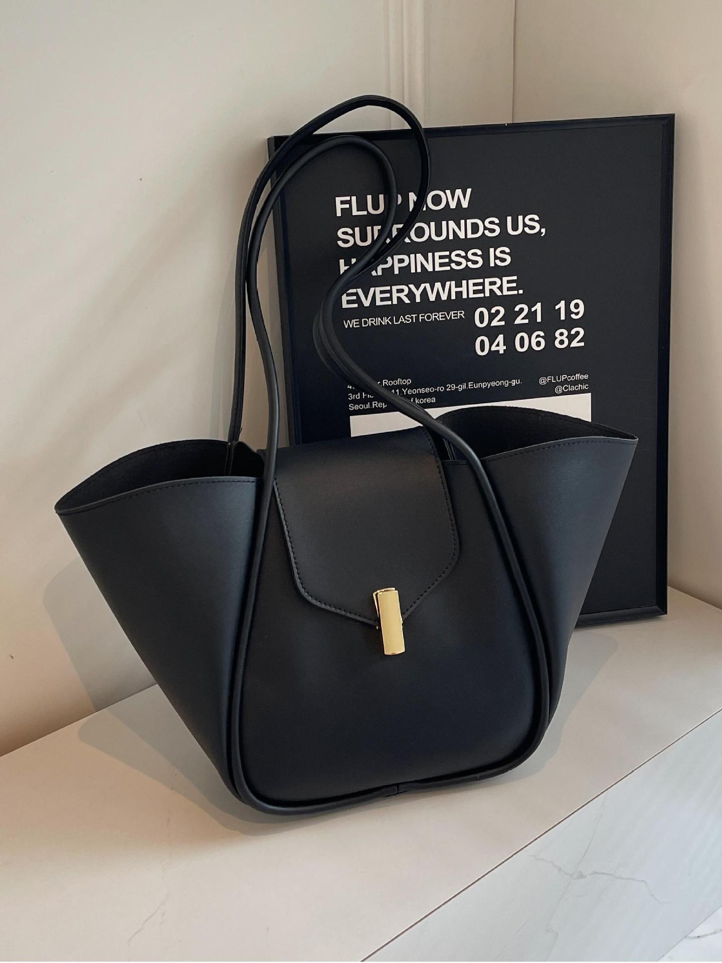 Bolso de cubo de gran capacidad explosivo transfronterizo para mujer 2025 nuevo bolso de hombro casual simple bolso de viaje de cuero suave