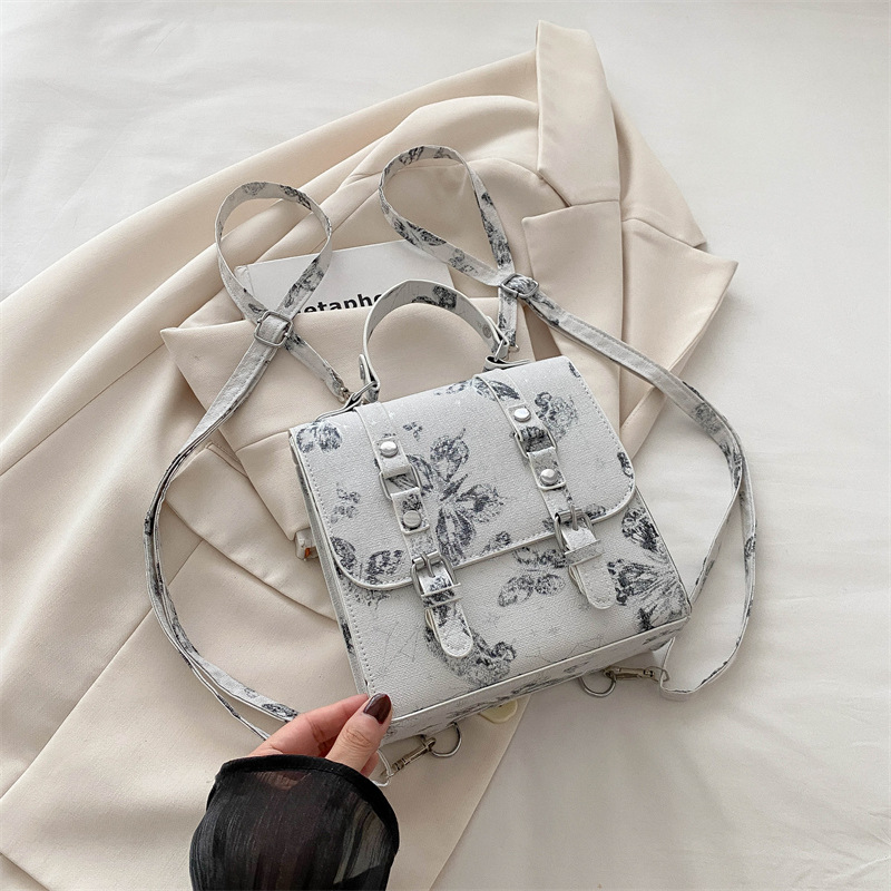 2024 nueva impresión universal mini bolso nuevo estilo chino chino de alto nivel de estilo extranjero nicho mochila mujer