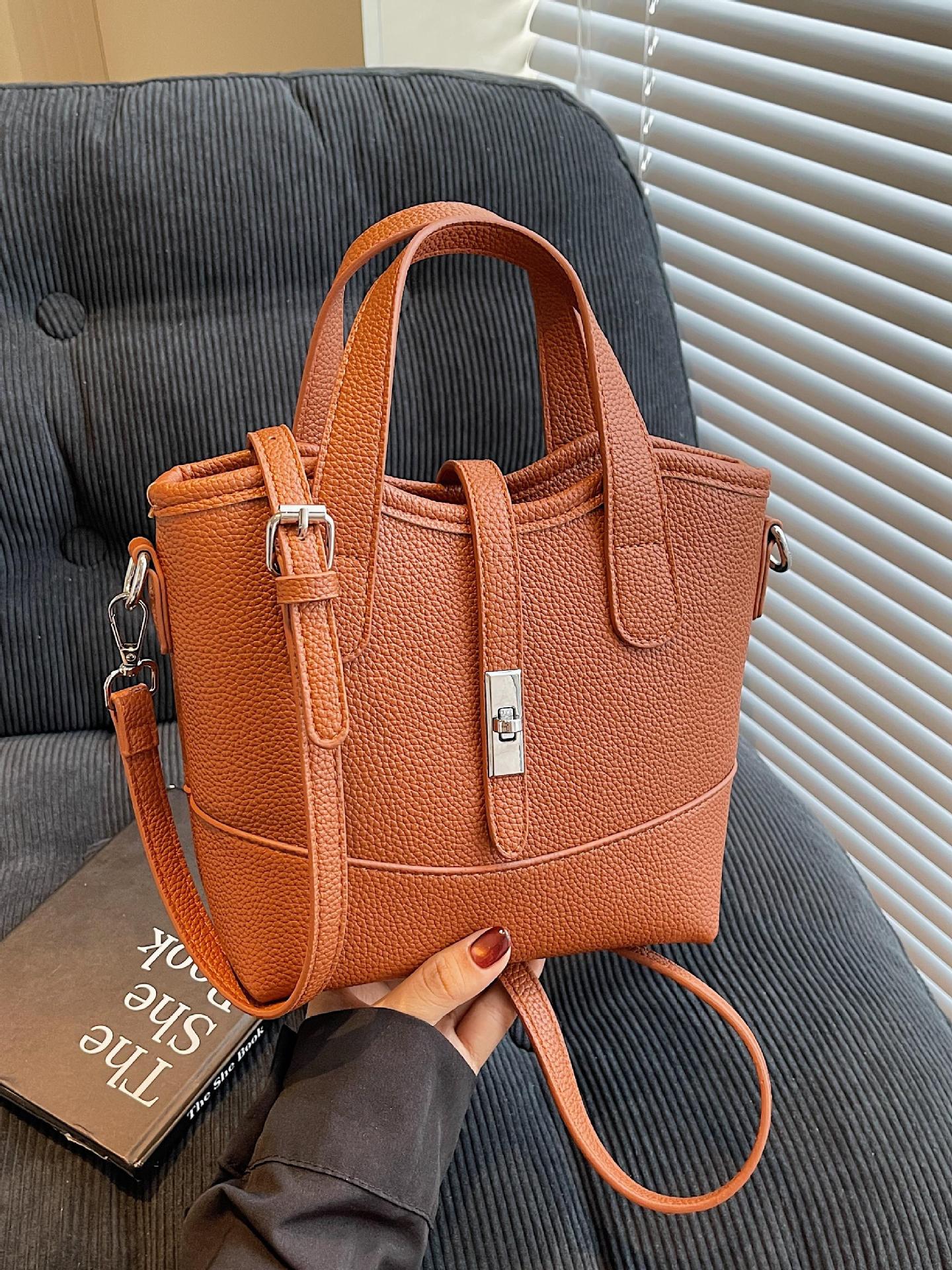 2025 nueva venta caliente transfronteriza bolso de cubo de mano moda femenina color de contraste fabricante de un solo hombro al por mayor bolso de mensajero sentido de alta gama