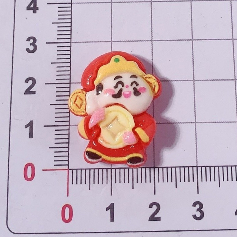 Año Nuevo dibujos animados dios de la fortuna Yuanbao accesorios de resina agujero zapatos caja de teléfono celular crema pegamento DIY automóvil control central dios de la fortuna