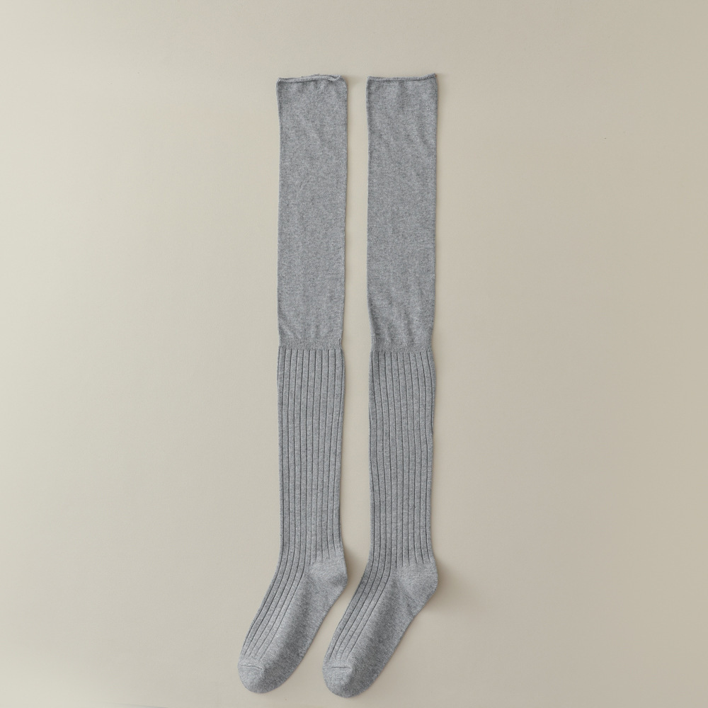 アングラの赤い櫛の綿の長い筒は膝の靴下の高い筒の純色のつなぎ合わせのinsの潮は妊婦の太ももの靴下に乗ります。