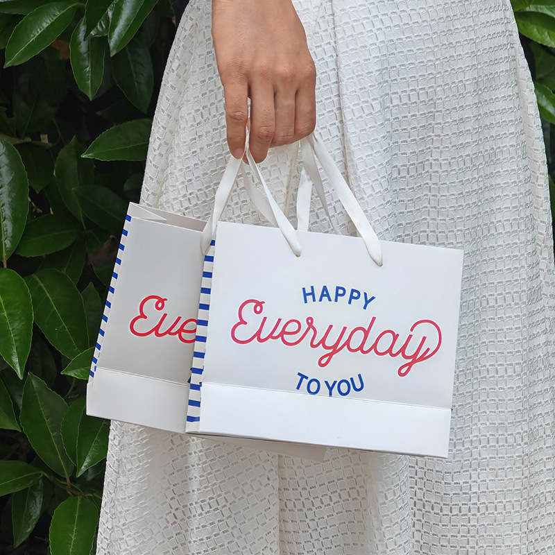 Cute Contrast Color English Letter Gray Horizontal Small Handbag in stock Square Color Printing Thickened White Cardboard Bag