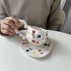 Белые крупные цветочные мотивы, чашка и блюдце 16 см