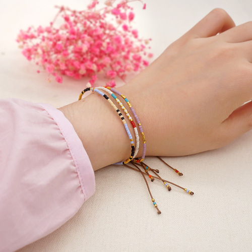 Bohemian style ins niche glass millet beads woven beads wholesale multi-layer stacked small women's bracelets