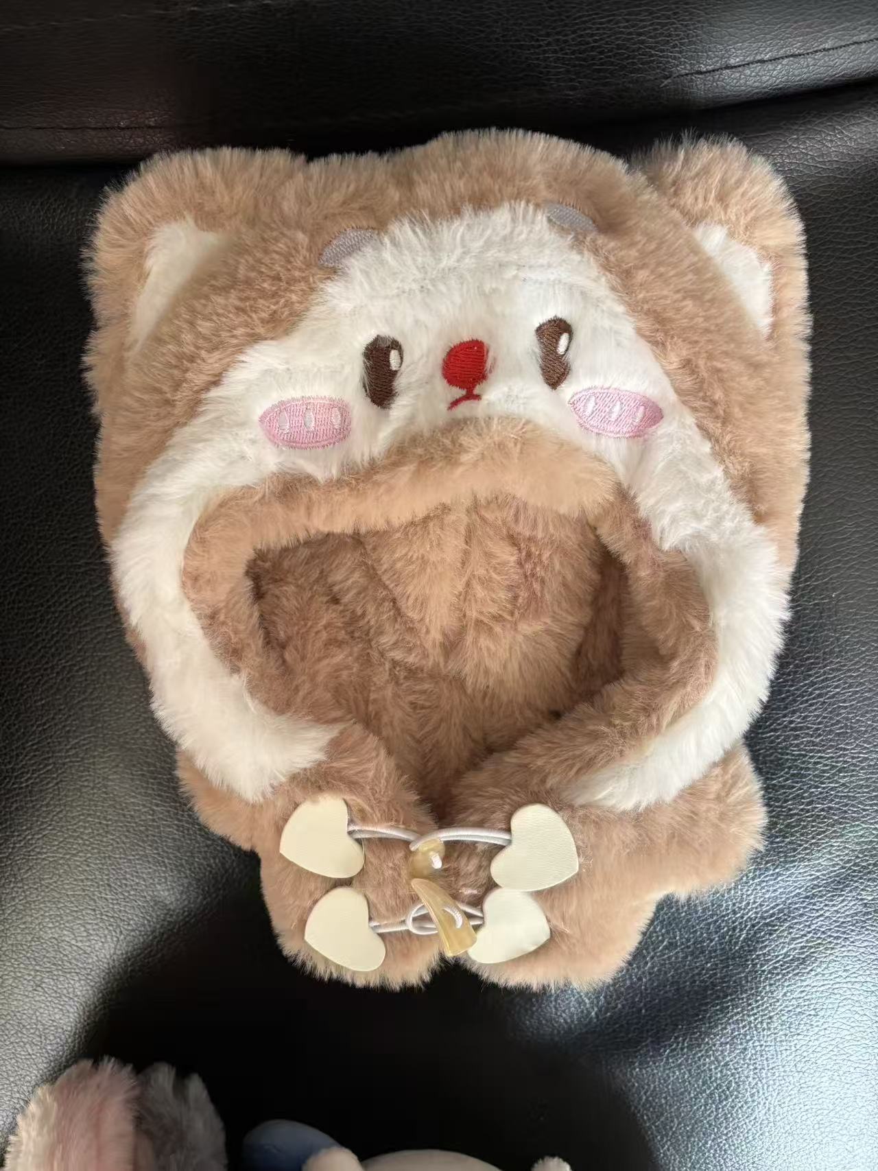 Brown doll, cat