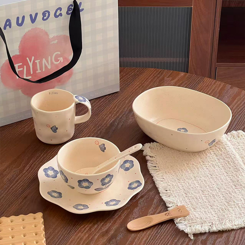 Hand-painted blue floral design, handmade rustic ceramic tableware set for one person, including ceramic bowls, plates, and mugs, a fresh and stylish set for home use, wholesale available
