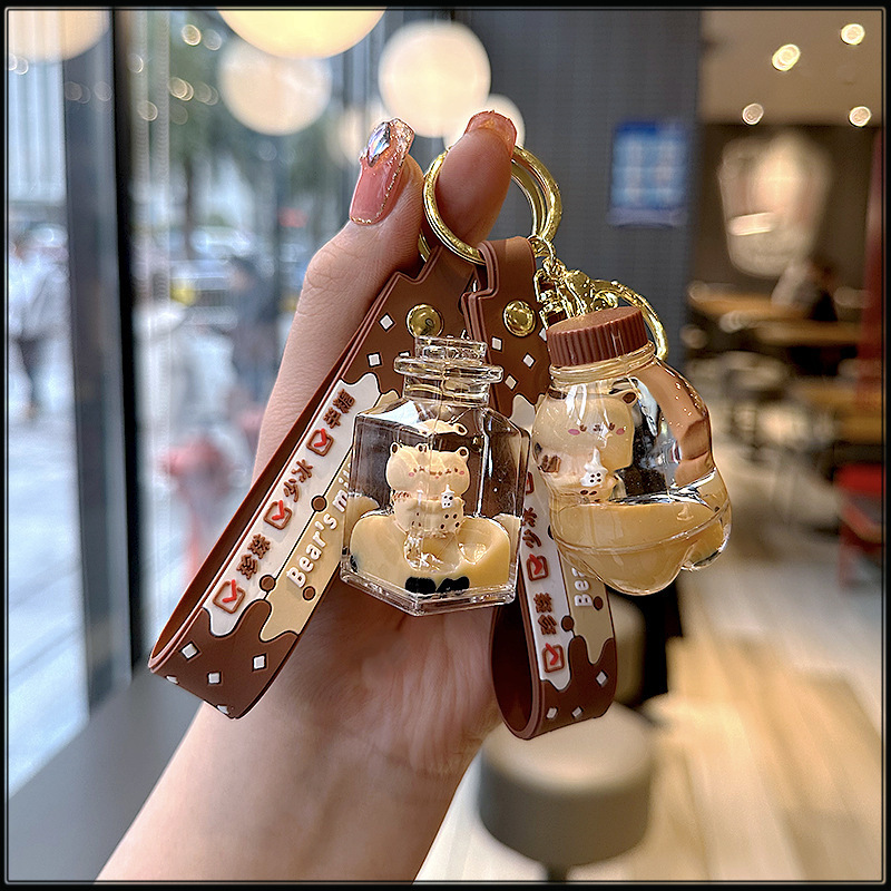 Cute Oil Milk Tea Bear Keychain Female Cartoon Exquisite Pearl Bear Quicksand Bottle School Bag Pendant Creative