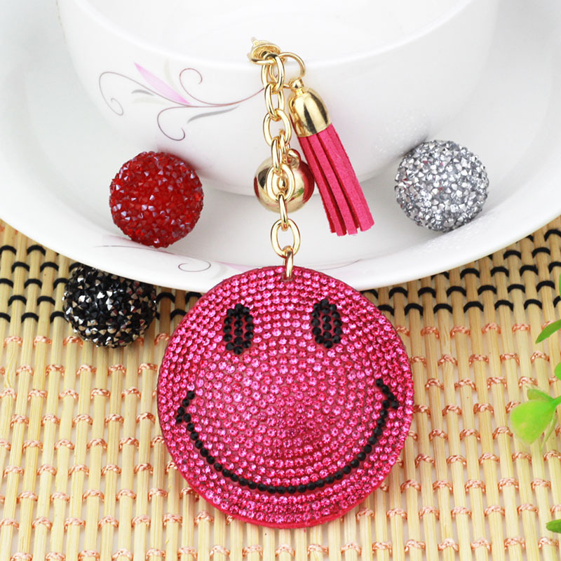 Nuevo creativo cara sonriente coreana llavero de diamante de moda borda de dama bolsos colgantes joyerías de comercio exterior al por mayor