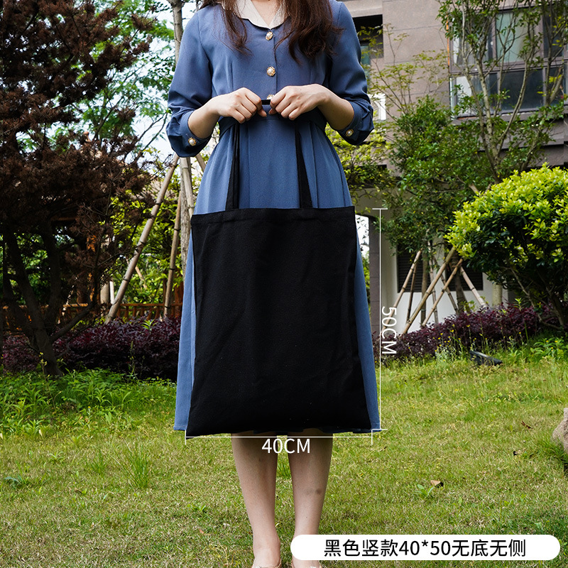 Bolsa de lona pequeña negra simple de las mujeres en stock bolsa de lona portátil en blanco Fábrica crossbody estudiante publicidad artística de un solo hombro