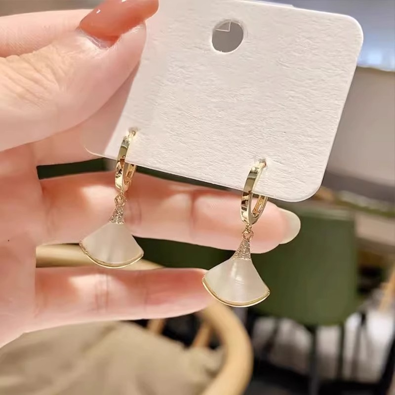 Golden design earrings