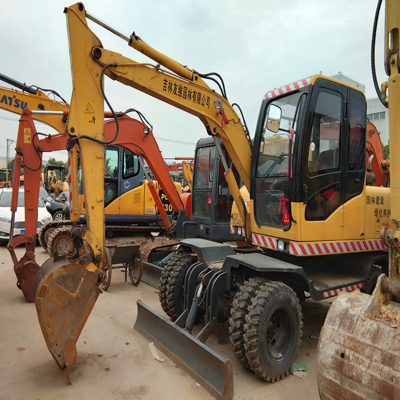 常年外贸 出售各种品牌60，70，80二手轮胎挖掘机质保一年