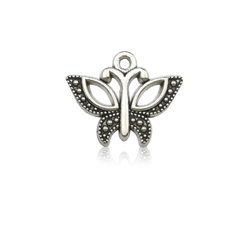 Venta transfronteriza de colgante de aleación de plata Xizanga con forma de mariposa, hecho a mano, para collar, pulsera, accesorio de joyería, venta al por mayor.