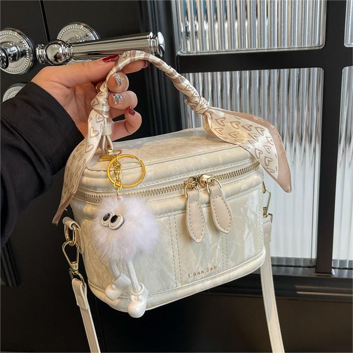 Bolsos versátiles sencillos de alta calidad para mujeres 2026 primavera y verano nuevo nicho bolso de cubo de diseño coreano bolso de hombro