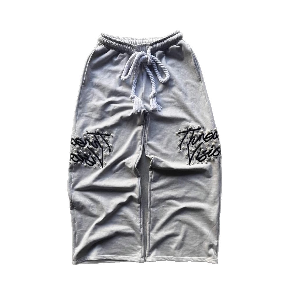 Pantalones sueltos bordados con cuentas bordados de la industria pesada retro de la calle alta europea y americana transfronteriza para hombres y mujeres pantalones casuales de pierna ancha hiphop
