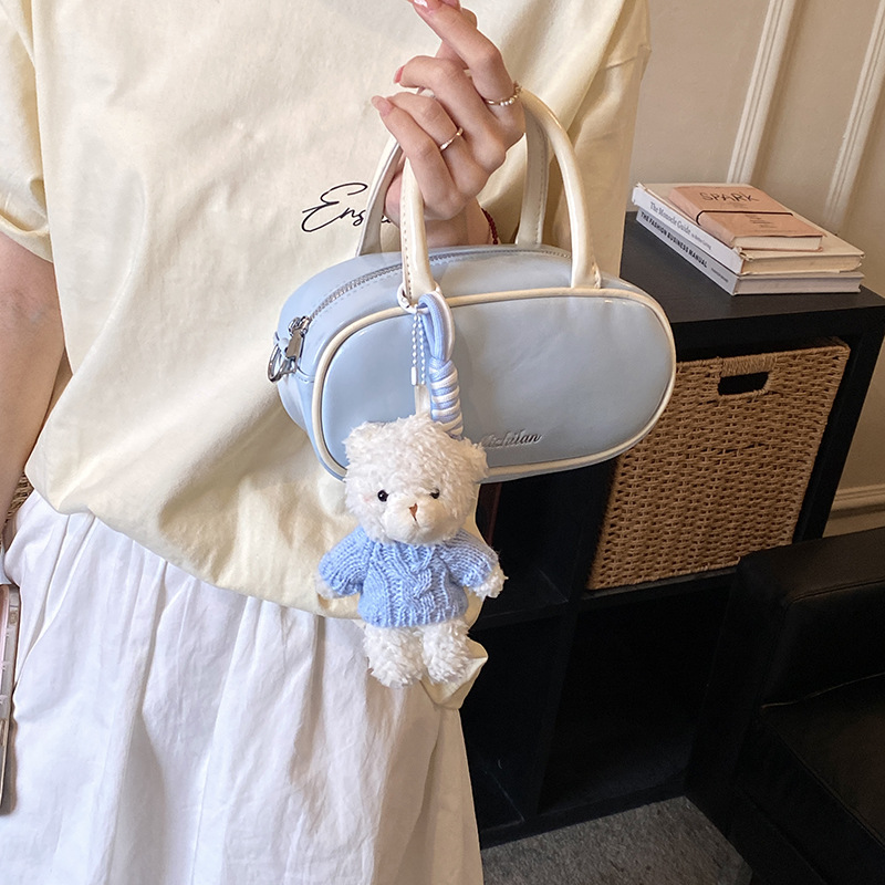 Bolsa de hombro coreana para niños y niñas simple de color sólido bolso de mano pequeño bebé adorable colgante bolso de accesorios para niños