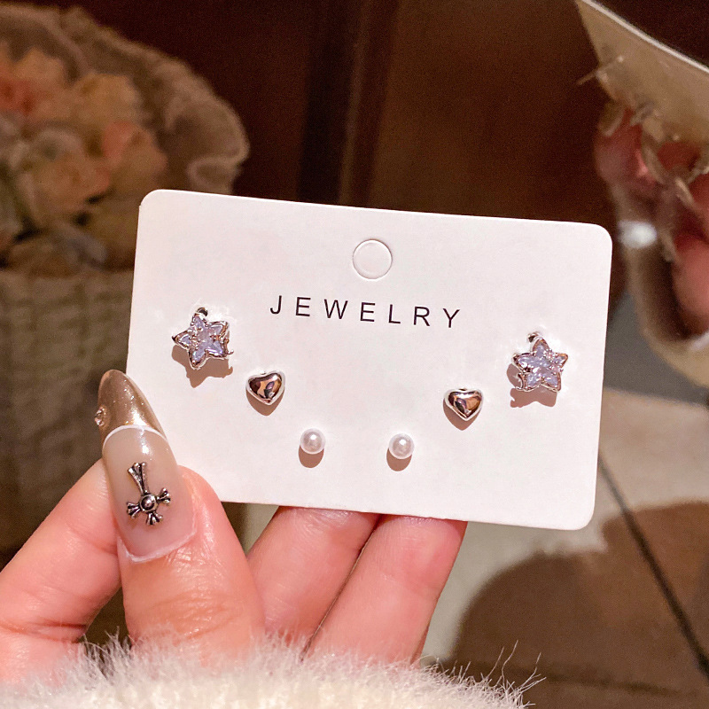 S925 aguja de plata exquisito ZIRCON oído-aumento traje pequeño oído espárragos Luz de lujo nicho versátil temperamento perla pendientes femeninos