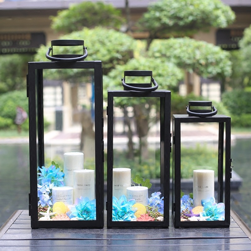 Europa simple y moderna retro vidrio forjado a prueba de viento candelabrera patio gran lámpara de viento al aire libre lámpara de boda