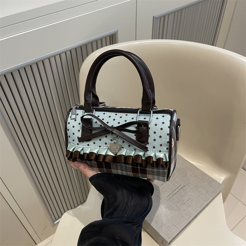 2025 nuevo arco de punto ondulado de alto valor, mochila de encaje a cuadrícula, mochila escolar universal para niñas, mochila