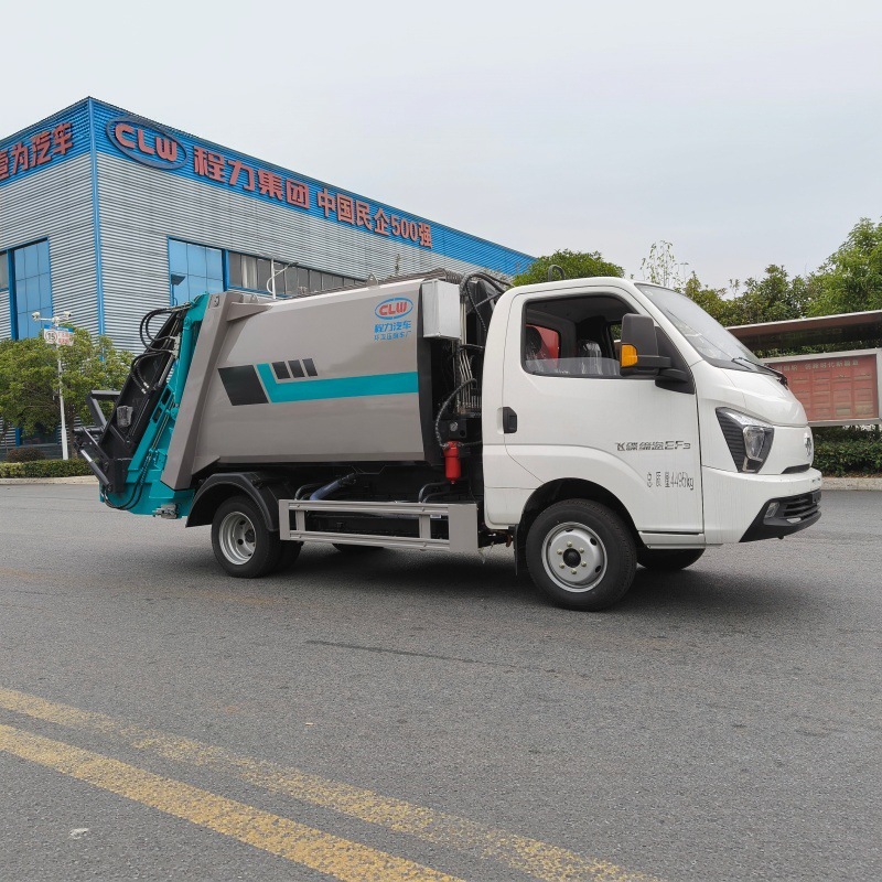 Pure electric sanitation vehicle with a sealed garbage compactor, designed for automatic compression of municipal solid waste for collection and transportation