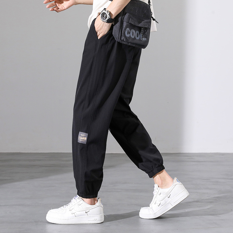 Otoño y primavera de verano de tendencia suelta pantalones casuales de pies de hielo pantalones de hombre nueve pantalones fuente de fabricación