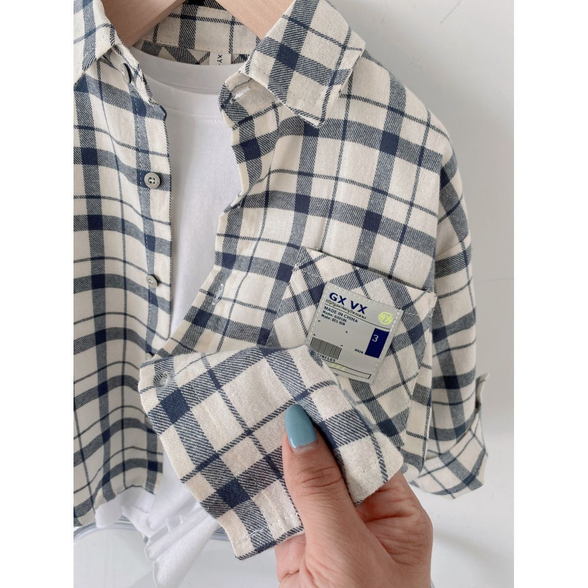 2026 nueva camisa de algodón a cuadros primavera y otoño de moda para niños con solapa cardigan camisa infantil