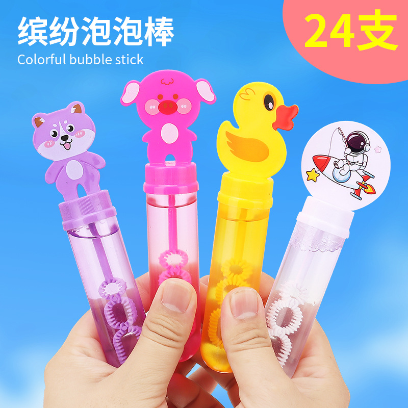 Mini barra de burbujas para niños sosteniendo un pequeño pato amarillo máquina de burbujas dispositivo de burbujas niños y niñas puestos callejeros juguetes al por mayor