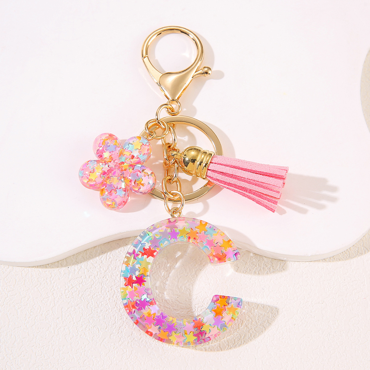 Un nuevo llavero flor de goteo de goma esquinilla 26 letras bolsos colgante llavero accesorios Yiwu