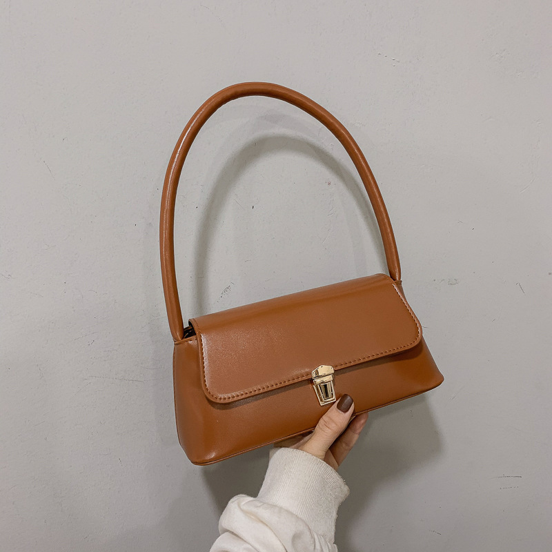 Nuevo 2023 bolso femenino otoño e invierno bolso de palo francés moda retro bolso de axila salvaje atmósfera portátil temperamento bolso de hombro