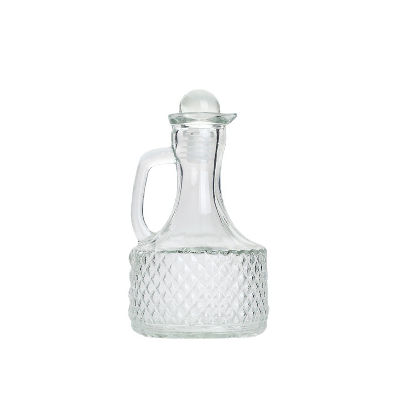 Amazon botellas de vidrio transparentes creativas de mango tallado botella de aceite botella de sabor de vino botella de salsa de soja empaquetada botella vacía al por mayor