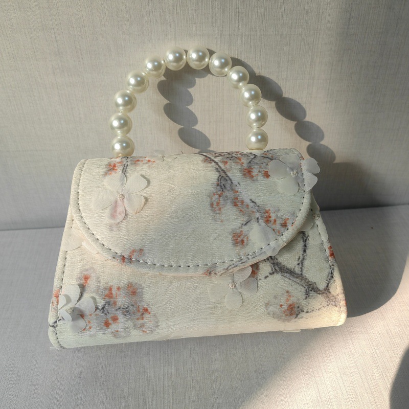 2025 primavera y verano estilo caliente moda casual niños dulces bolsa de gelatina mini bolso de mensajero de un solo hombro variedad al por mayor