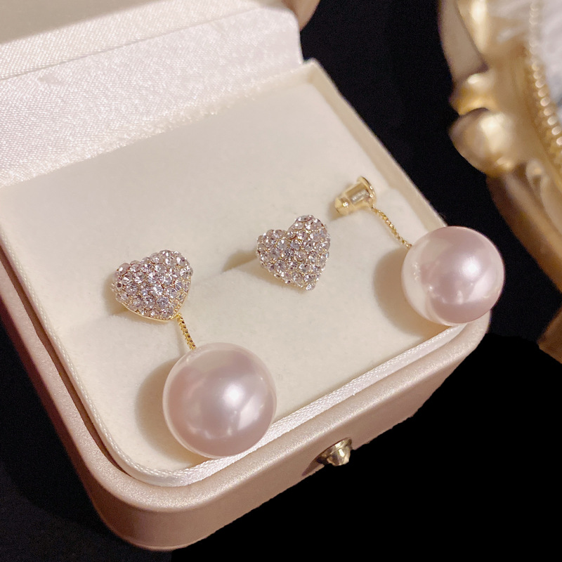 Una perla de dos piezas con diamantes incrustados pendientes encantadores nicho pendientes de aguja de plata 2022 nuevos pendientes de chica de temperamento de moda