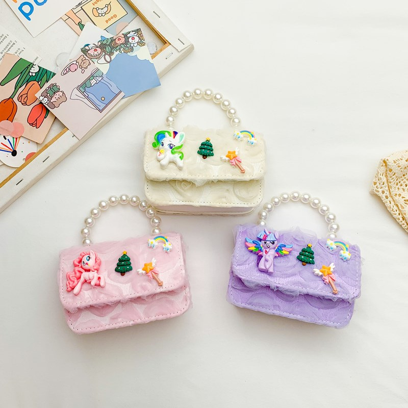 Dulce princesa bolso de hombro de perlas portátiles 2025 mini bolso de cadena de arco para niños