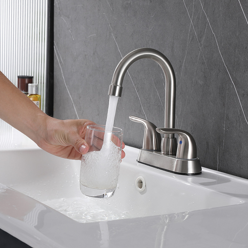 Comercio exterior transfronterizo grifo de lavabo de estilo americano de 4 pulgadas de doble mango lavabo de baño grifo frío y caliente