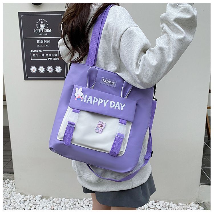 Large-capacity file bag, primary school student handbag that can be carried on one shoulder, book bag for girls with high appearance standards, homework books and test papers bag Item Picture