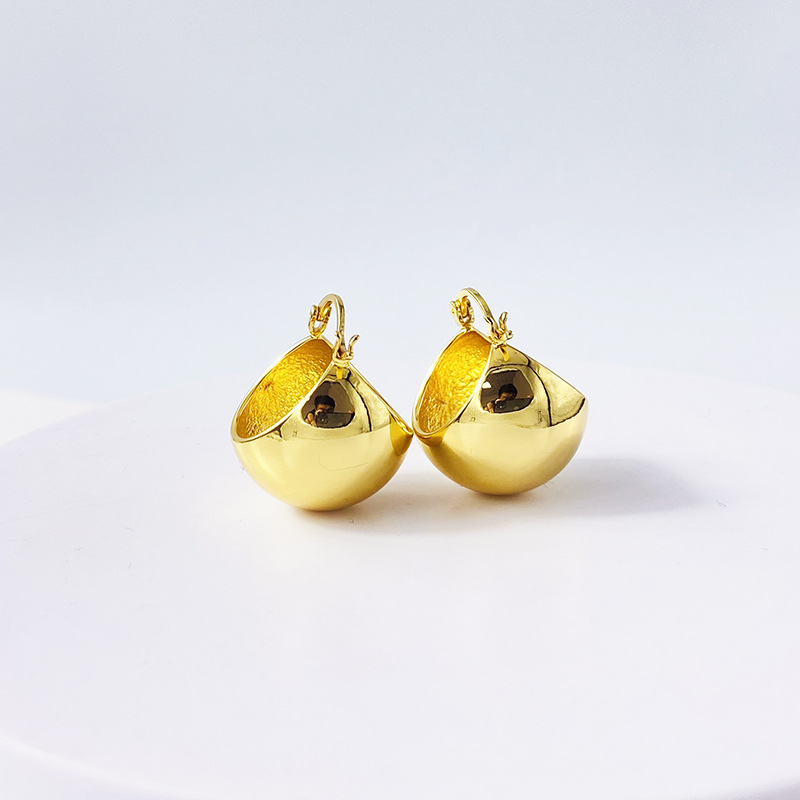 Celi style retro exaggerated hollow ball earrings simple fashionable brass gold-plated ball earrings